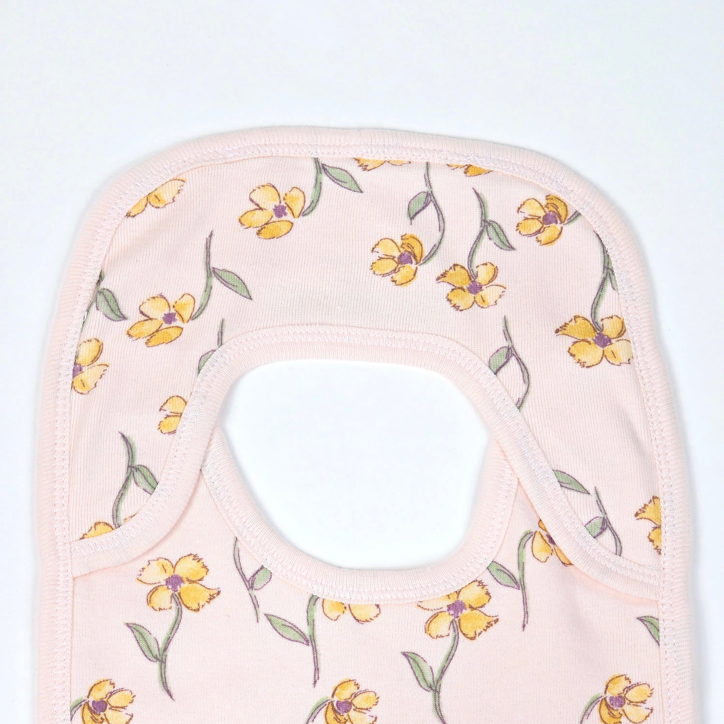 Baby Bib With A Floral Pattern